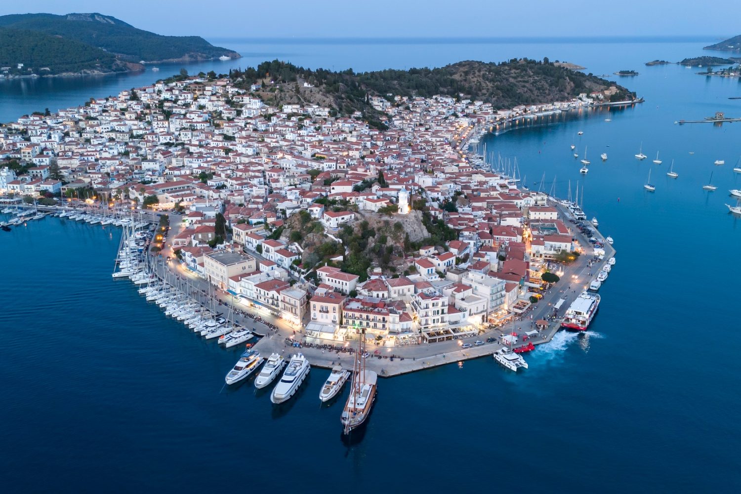 Aerial panorama of the city and harbor of Poros island in the Saronic Gulf, Greece,