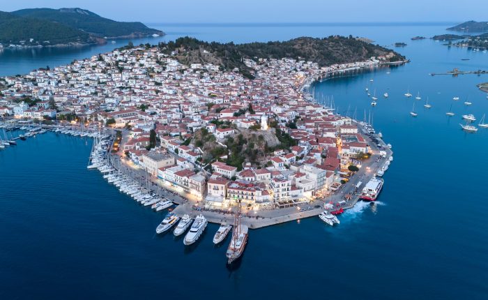 Aerial panorama of the city and harbor of Poros island in the Saronic Gulf, Greece,