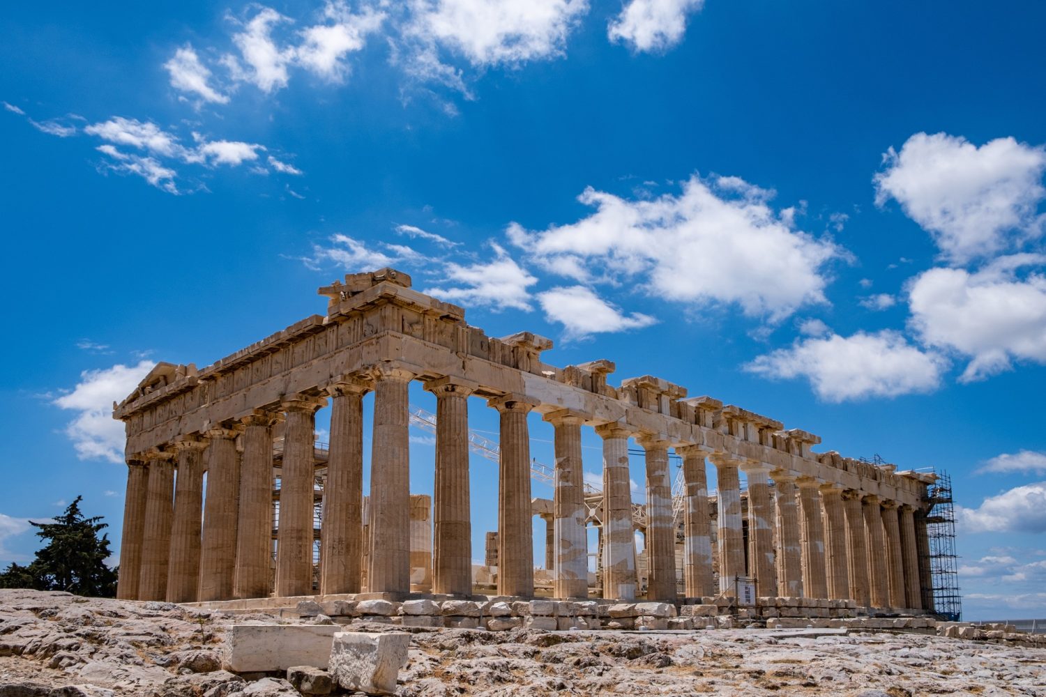Athens, Greece. Parthenon temple on Acropolis hill, blue sky background