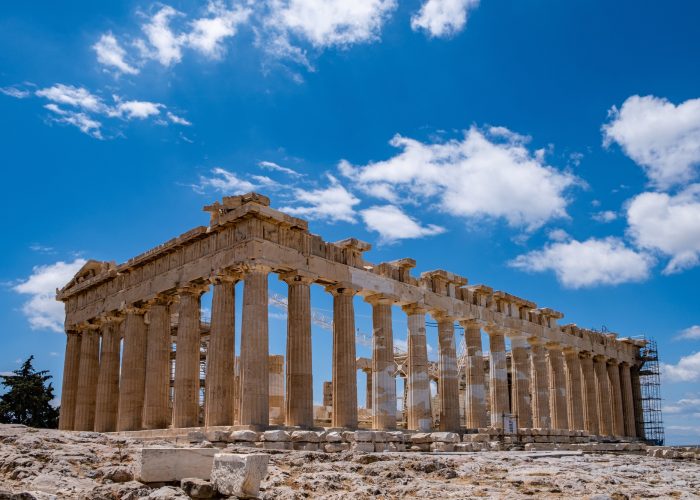 Athens, Greece. Parthenon temple on Acropolis hill, blue sky background