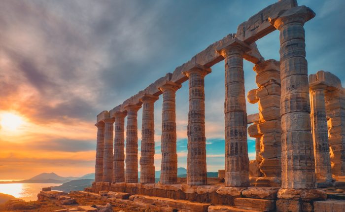 Poseidon temple ruins on Cape Sounio on sunset, Greece